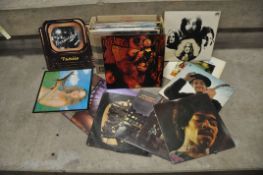 A TRAY CONTAINING OVER THIRTY LPs including Band of Gypsies by Jimi Hendrix ( standard gatefold