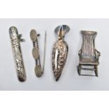 FOUR WHITE METAL ITEMS, to include a brooch flower holder, with an embossed floral pattern and