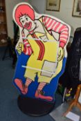 A LARGE RONALD MCDONALD DISPLAY BOARD, with holder for advertisements or notices, plastic coated