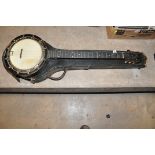 THE NEW WINDSOR FIVE STRING BANJO with plaque to neck heal stating name, walnut neck, ebonised
