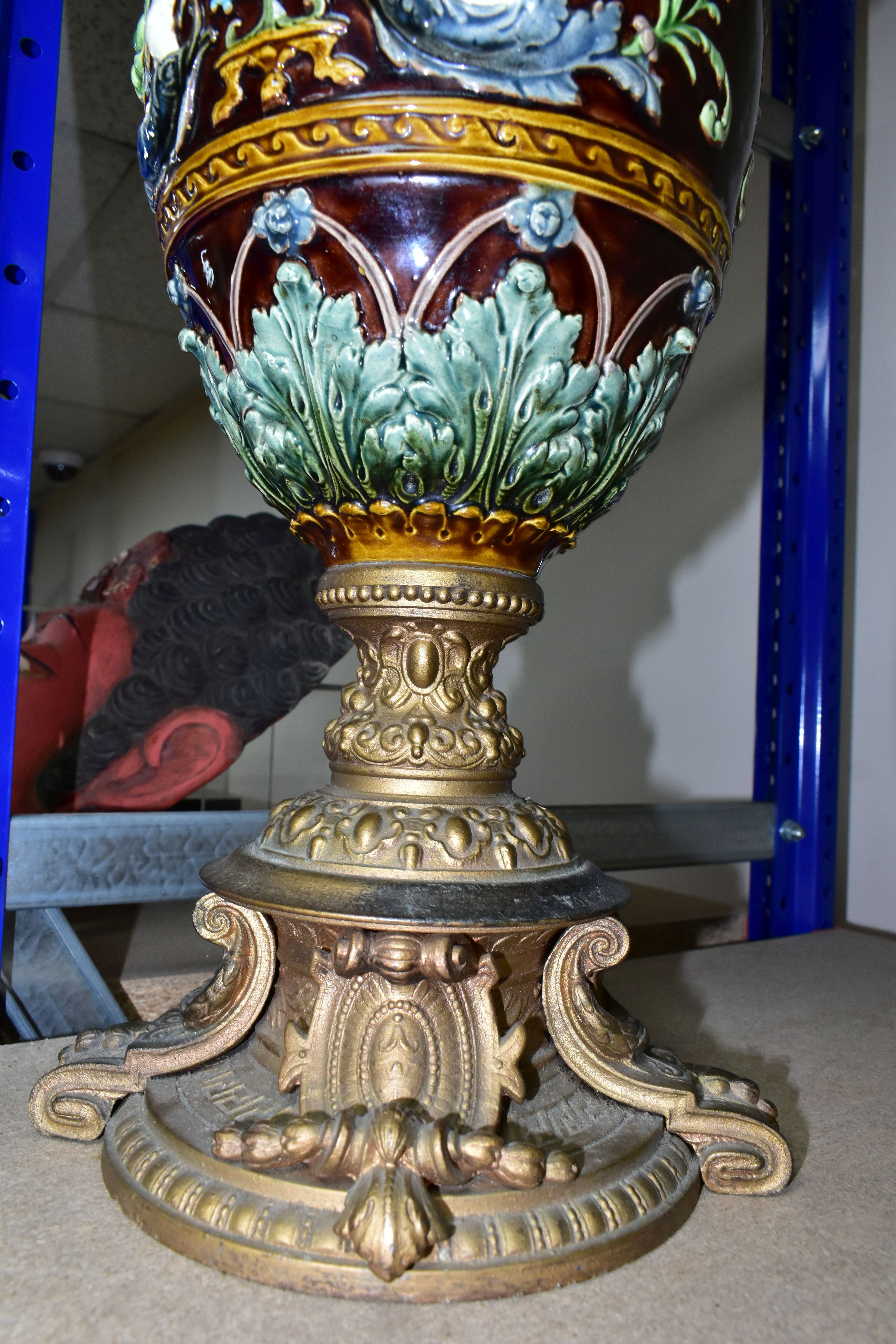 A PAIR OF LATE VICTORIAN GILT SPELTER AND MAJOLICA EWERS, the scrolling handle cast with a beast and - Image 4 of 5