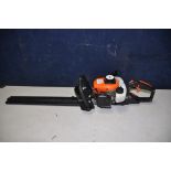 A VIDAXL.COM PETROL HEDGE TRIMMER with 22in cut ( engine pulls freely but hasn't started)