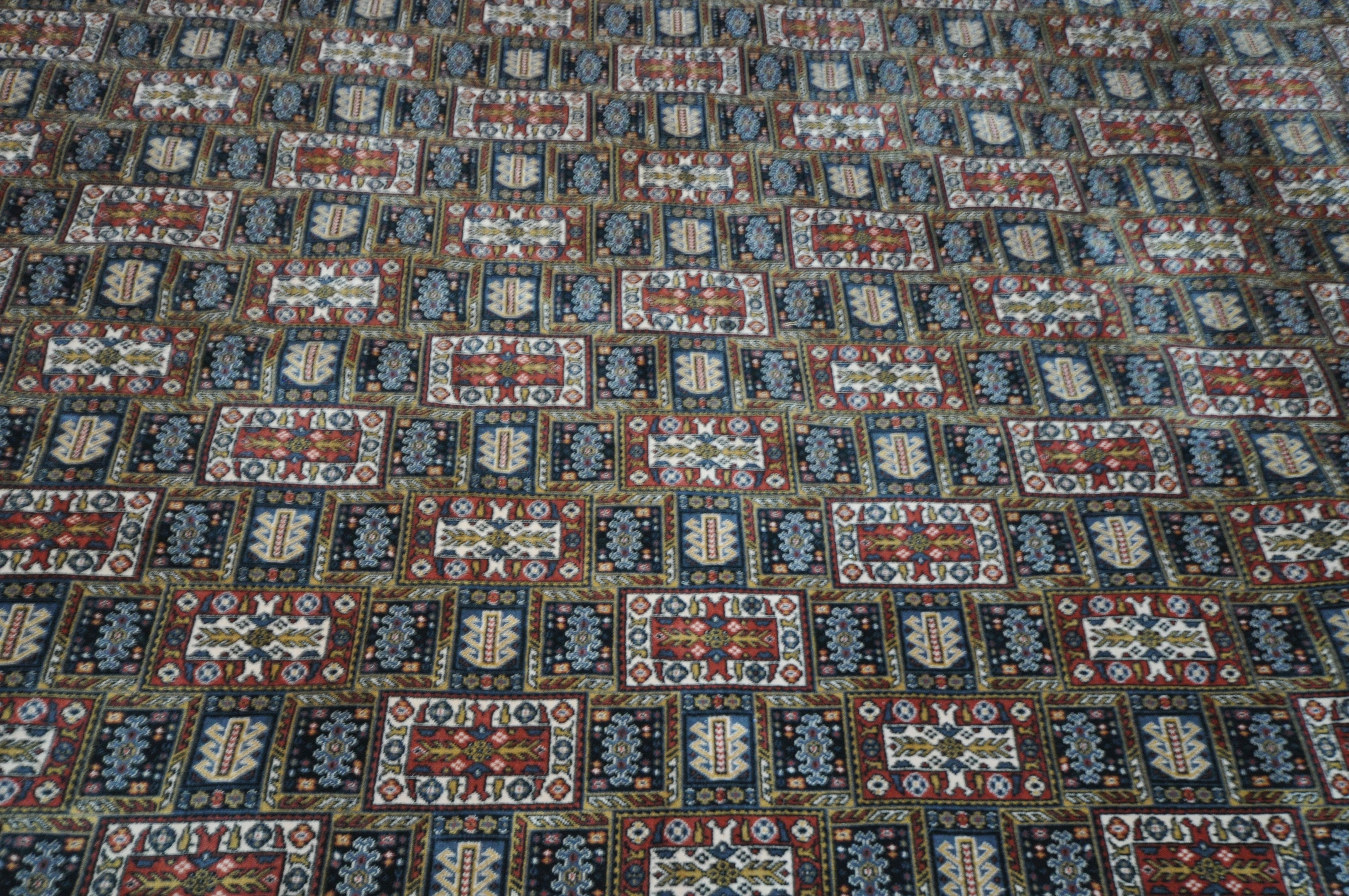 A GROSVENOR 100% WOOLLEN CARPET SQUARE, of a multicolour design in a geometric style, 366cm x - Image 2 of 4