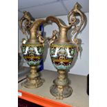 A PAIR OF LATE VICTORIAN GILT SPELTER AND MAJOLICA EWERS, the scrolling handle cast with a beast and