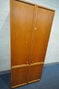 A LARGE G PLAN TWO DOOR WARDROBE, width 90cm x depth 59cm x height 204cm (condition - slight