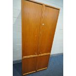 A LARGE G PLAN TWO DOOR WARDROBE, width 90cm x depth 59cm x height 204cm (condition - slight