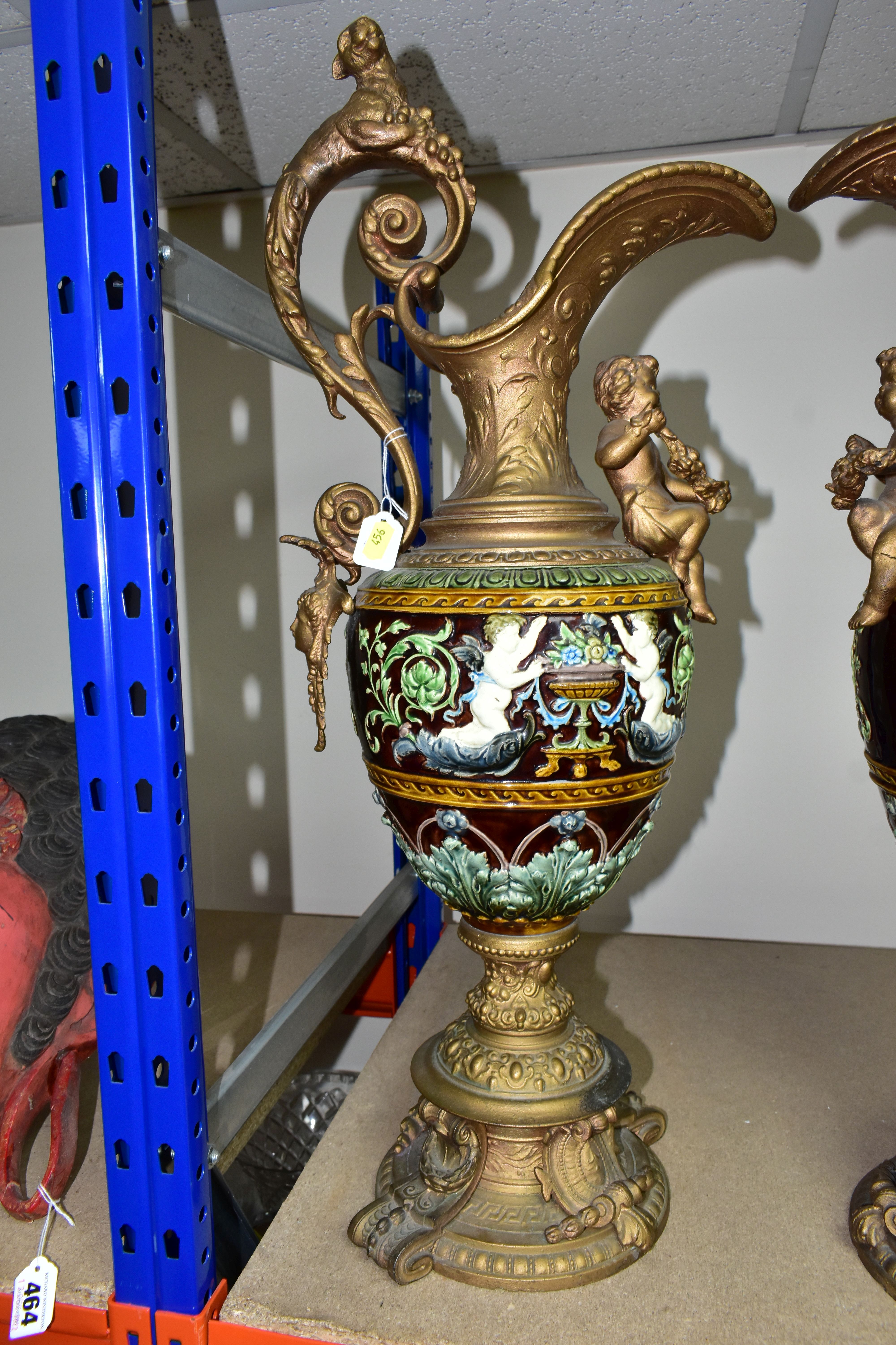 A PAIR OF LATE VICTORIAN GILT SPELTER AND MAJOLICA EWERS, the scrolling handle cast with a beast and - Image 2 of 5