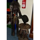 A CARVED WOODEN STOOL AND TRIBAL FIGURE, comprising a carved figural stool, height 41cm, together
