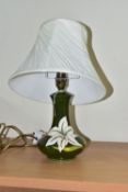 A MOORCROFT POTTERY TABLE LAMP, of compressed form, decorated in the white 'Bermuda Lily' pattern on