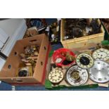 FOUR BOXES OF CLOCK PARTS, to include clock movements, gears, dials, bezels, glass, pendulums,