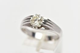 A WHITE METAL DIAMOND SINGLE STONE RING, set with an early brilliant cut diamond, measuring