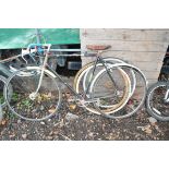 A FREDDIE GRUBB VINTAGE RACING BIKE, with 5 speed lever Campagnolo gears, a tatty Brookes leather