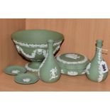 A GROUP OF WEDGWOOD GREEN JASPER WARE, comprising a footed bowl decorated with swags of grapevines