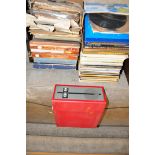 A FIDELITY RECORD PLAYER in red covering (not working) and two trays containing classical and