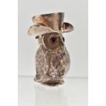 A NOVELTY WHITE METAL VESTA CASE, in the form of realistically textured owl wearing a cowboy hat,