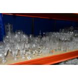 A QUANTITY OF CUT CRYSTAL AND GLASSWARES, comprising a Waterford Lismore pattern ship's decanter,