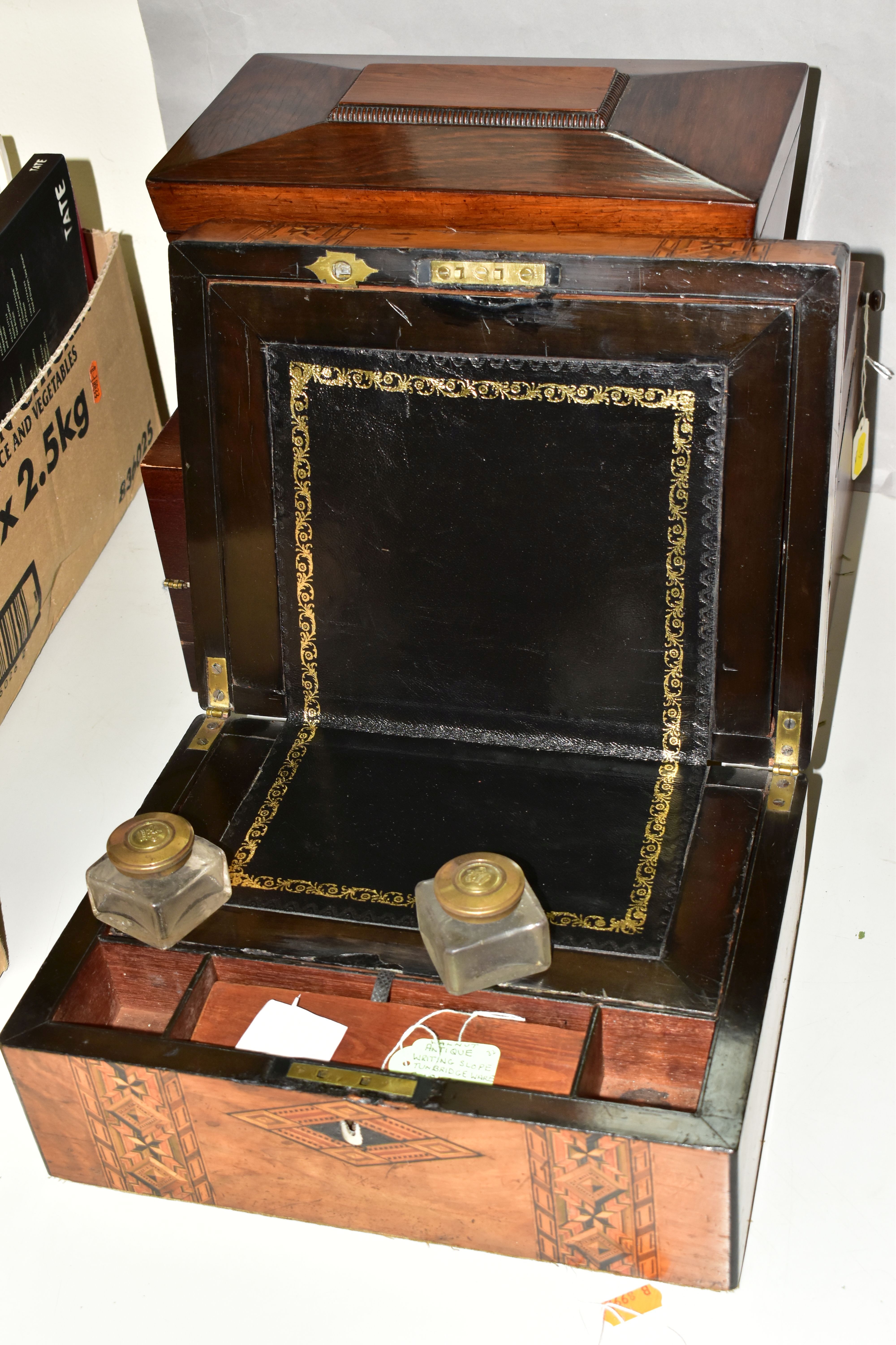 A REGENCY ROSEWOOD TEA CADDY AND TWO WRITING SLOPES, the tea caddy of sarcophagus form supported - Image 3 of 9