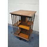 AN EARLY 20TH CENTURY MAHOGANY TWO TIER REVOLVING BOOKCASE, 55cm squared x height 90cm (condition:-