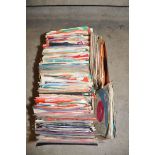 A TRAY CONTAINING APPROX TWO HUNDRED 7in SINGLES artists include The Rolling Stones, The