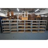 TWELVE ASSEMBLED GALVANISED RACKING SHELVING, all with five mdf shelves, and a quantity of loose