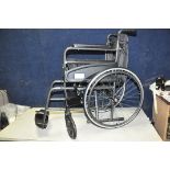 AN AIDAPT FOLDING WHEELCHAIR, with footrests