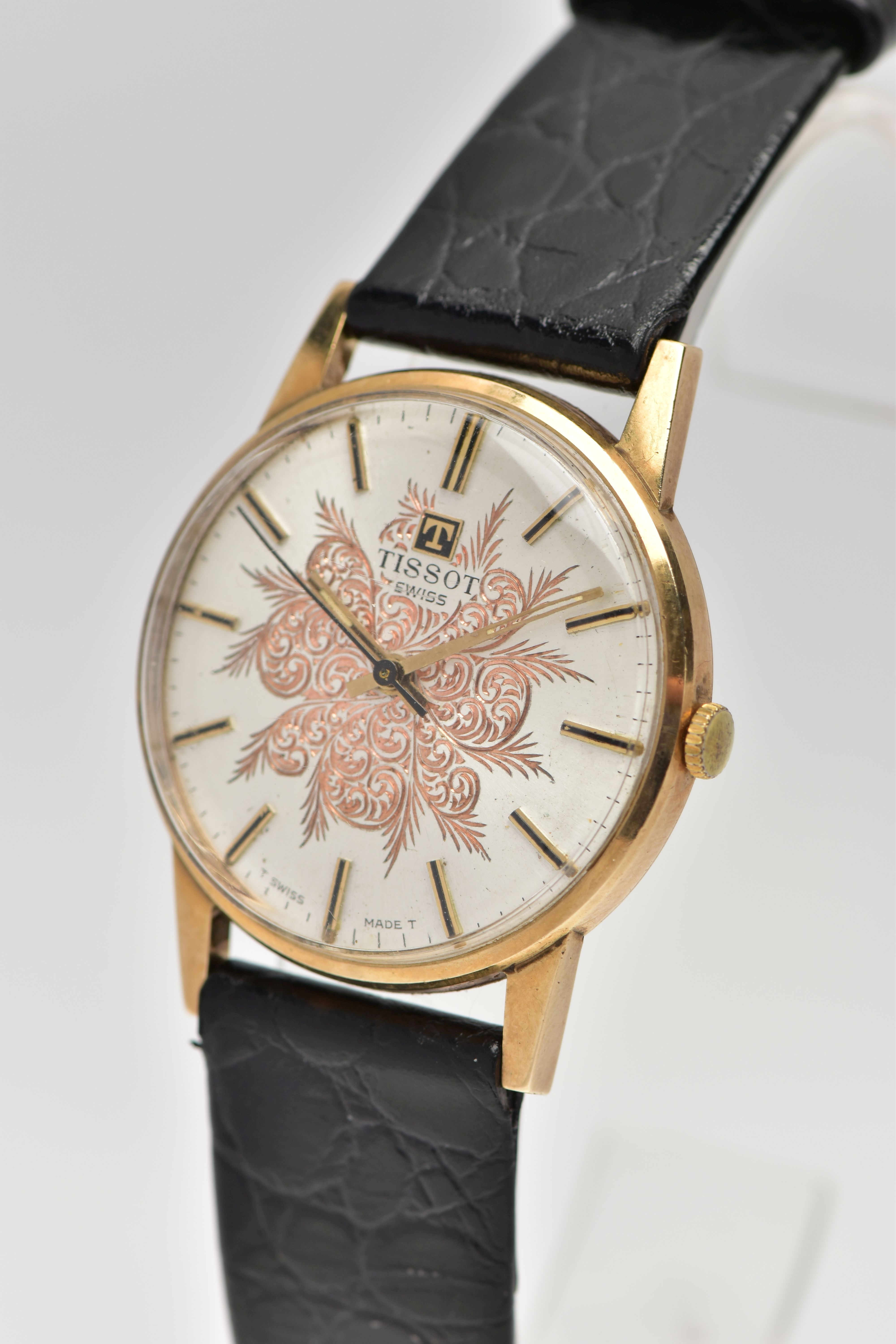 A 9CT YELLOW GOLD TISSOT WRISTWATCH, the silver coloured dial, with black enamel and gilt hourly - Image 3 of 6