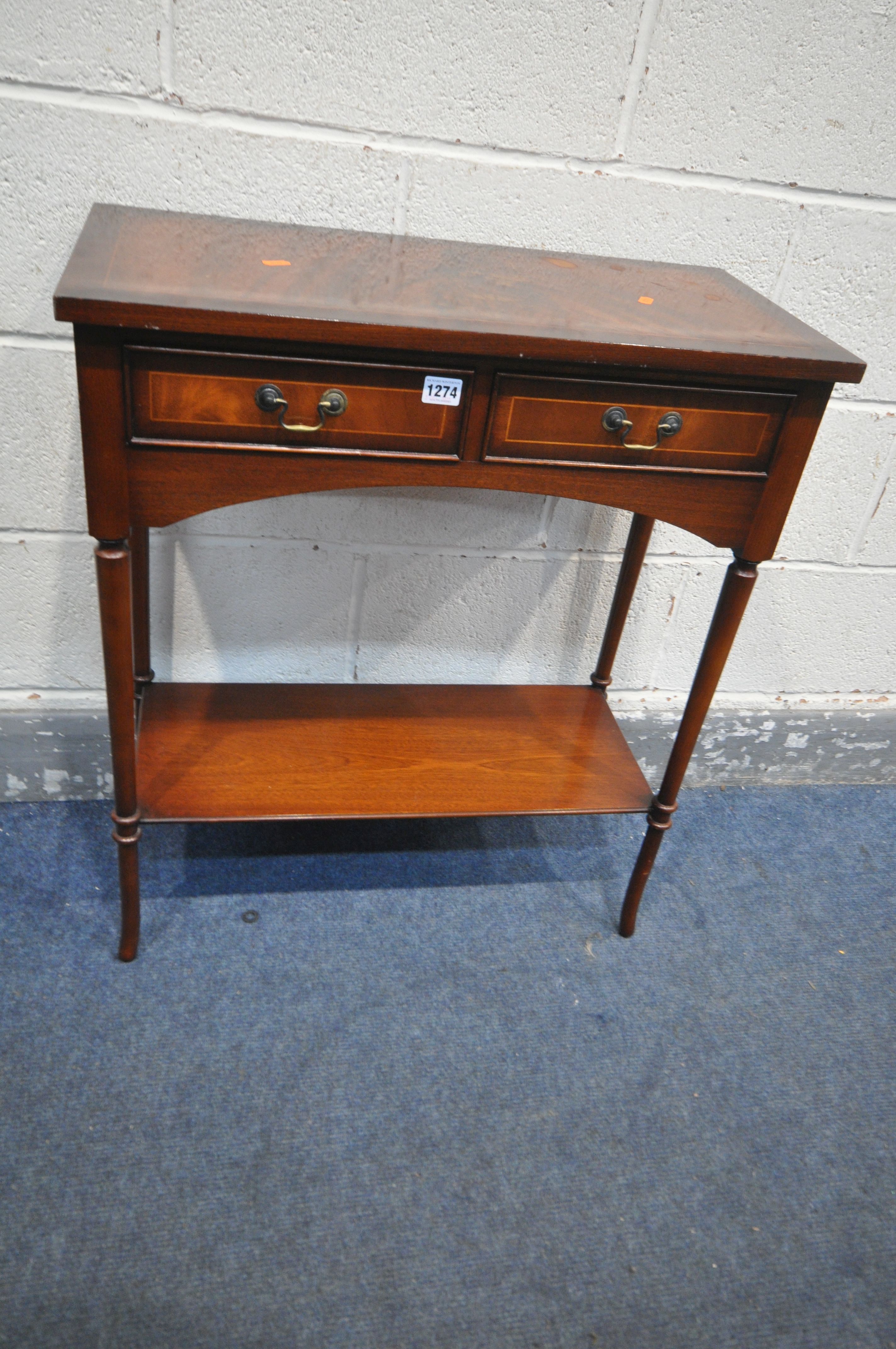 A BRIGHTS OF NETTLEBED MAHOGANY SIDE TABLE, with two drawers on cylindrical tapered legs, united