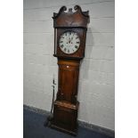 A GEORGIAN OAK EIGHT DAY LONGCASE CLOCK, the hood with a swan neck pediment, reeded pillars flanking