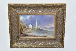 W. CLARK AN EARLY 20TH CENTURY COASTAL LANDSCAPE, a lighthouse stands overlooking a bay with a