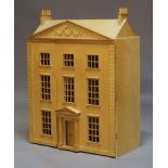 A modern plywood dolls house, the Georgian style front opening to six rooms, entrance hall and two