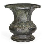 A Chinese bronze archaistic 'ribbon' vase, Ming dynasty, of compressed globular form with a