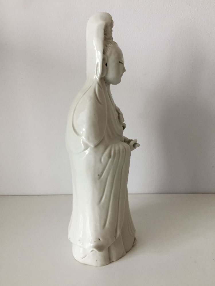 A Chinese Dehua porcelain figure of Guanyin, 19th century, modelled standing with long flowing - Image 8 of 11