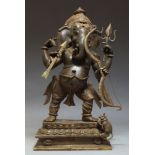 A large bronze Ganesha, 20th century, modelled holding a bow and arrow, both detachable, the