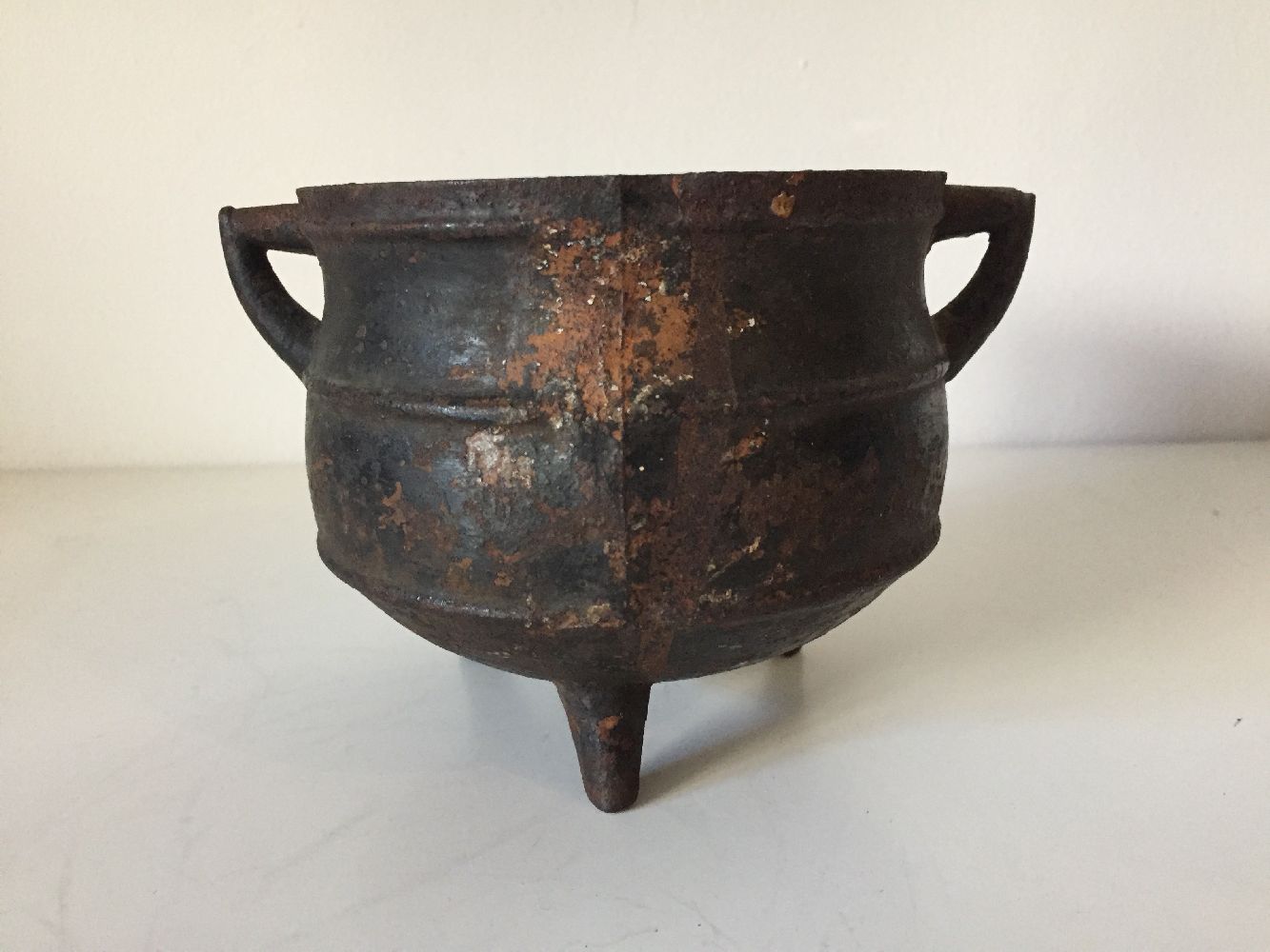 A Chinese iron cauldron form censer, 16th century, with two angular handles, the body decorated with - Image 2 of 6