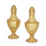 A pair of silver-gilt muffineers, London, 1904, imported by Faudel Phillips & Sons, 16cm high (2)