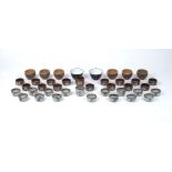 A quantity of saki cups, of modern manufacture, ceramic, in varying sizes and glaze finishes, hand-
