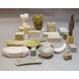 A collection of sculptures by Robert Bage, modern, each varied in size, form and stone composite,