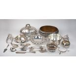A group of silver plate including: a domed dish cover with stylised branch handle, 33.2cm long; a