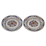 A pair of Chinese export porcelain Imari dishes, 18th century, decorated with floral sprays, 22.