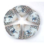 A set of five Japanese porcelain imari fan dishes, early 19th century, painted with flowering prunus