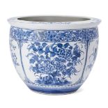 A Chinese blue and white porcelain jardiniere, 20th century, decorated with panels of lotus leaves