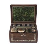 A mid Victorian mother-of-pearl inlaid rosewood toilet box, fitted with various silver plated