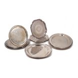A quantity of silver plated trays and platters including: a twin-handled rectangular tray with