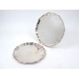 A shaped silver tray, Birmingham, 1945, Charles S Green & Co., with pie crust border, 36cm dia.,