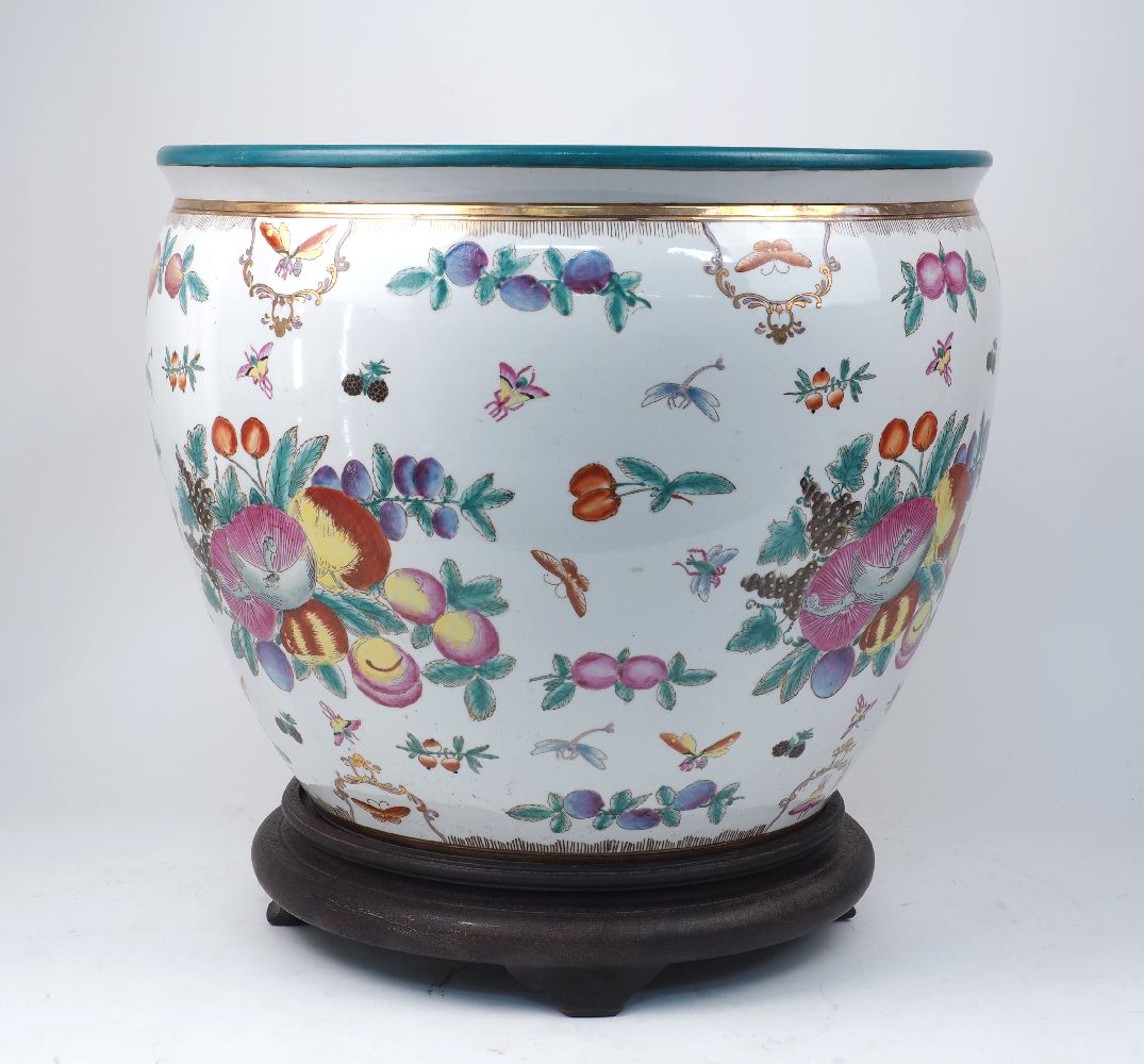 A pair of large Chinese jardinières and stands, 20th century, of recent manufacture, decorated