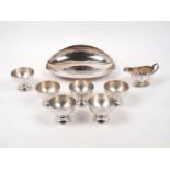 A small George V silver sauce boat, Sheffield, 1911, William Hutton & Sons, together with a
