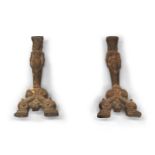 A pair of cast-iron figural andirons of 17th century style, 19th century, the uprights cast as a