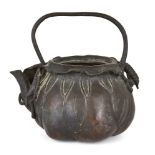 A Japanese bronze teapot, Meiji period, 19th century, cast as a lotus plant, 14cm highPlease refer