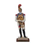 A Van Gerdinge / Sitzendorf porcelain figure of an 1812 Carabinier-à-Cheval of the Regiment de