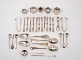 A group of silver comprising: three Georgian and one Victorian silver table spoons; a Belgian silver